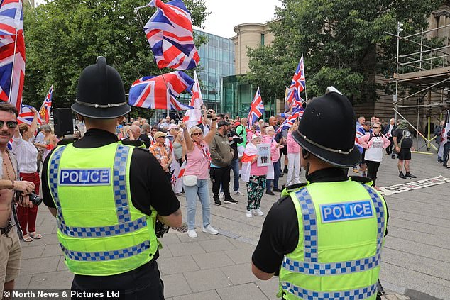 Rival protest groups clash outside the New Bridge Hotel in Newcastle on Saturday afternoon