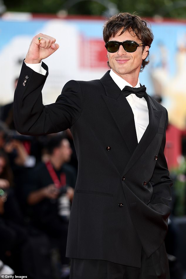 Jacob also wore a black double-breasted suit and sunglasses