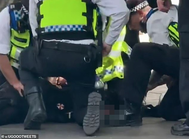He was arrested on suspicion of possession of an imitation firearm in Fulham Broadway