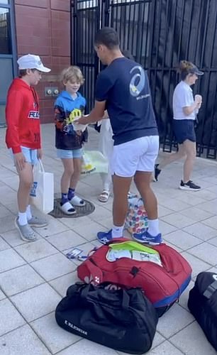 Majchrzak appeared to be handing over some merchandise