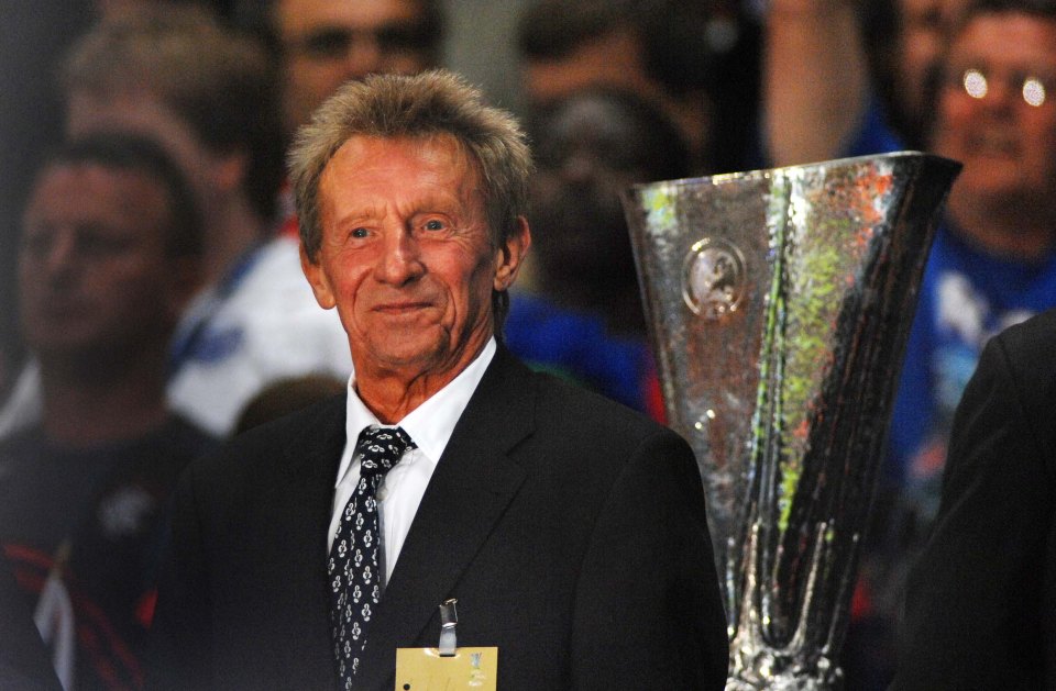 Denis Law, former Manchester United player, at a trophy presentation.