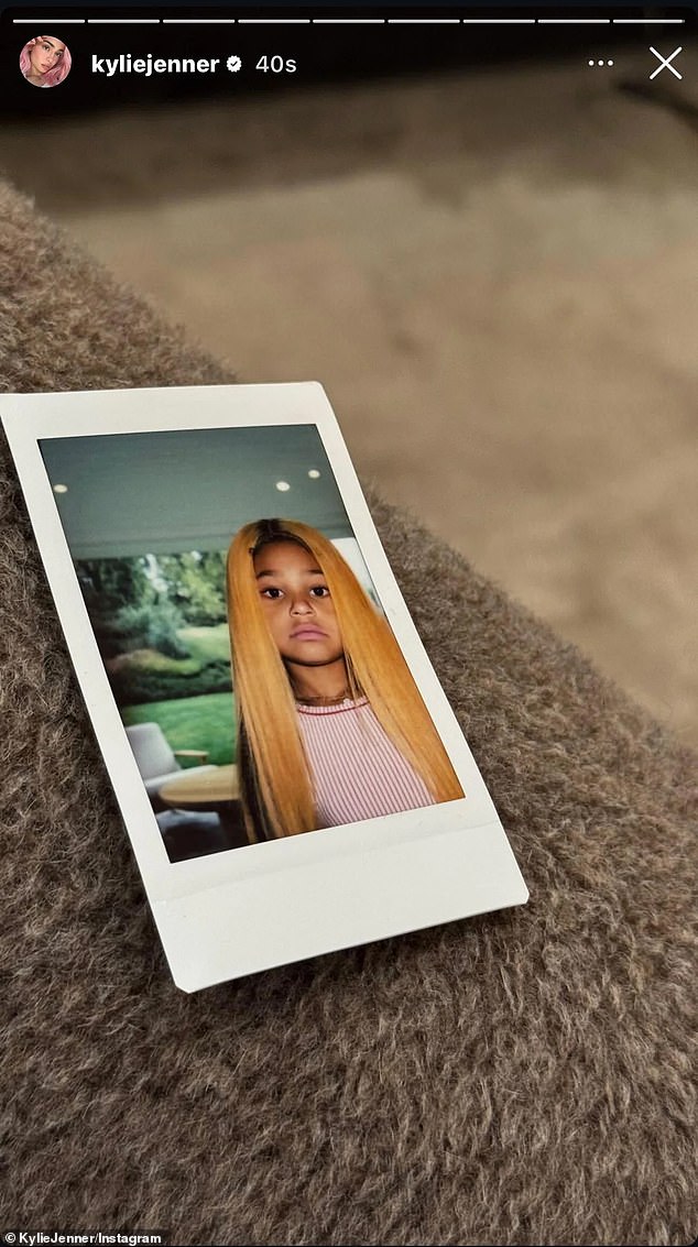 The 28-year-old Khy founder took to Instagram on Thursday to share a polaroid snapshot of her mini-me, seven, sporting an orange-tinged wig