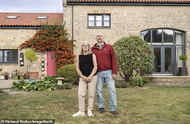 Ms Hewson (pictured with her husband Terry) told the MoS: ¿I am incredibly sad. We bought this barn off the beaten track, it¿s a mile away from anything and surrounded by fields. We have lived here for 30 years but I don¿t want to be surrounded by solar panels for the rest of my life'