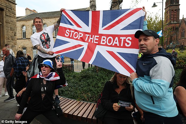 Anti-migrant protesters demonstrate in Falkirk, Scotland on Saturday