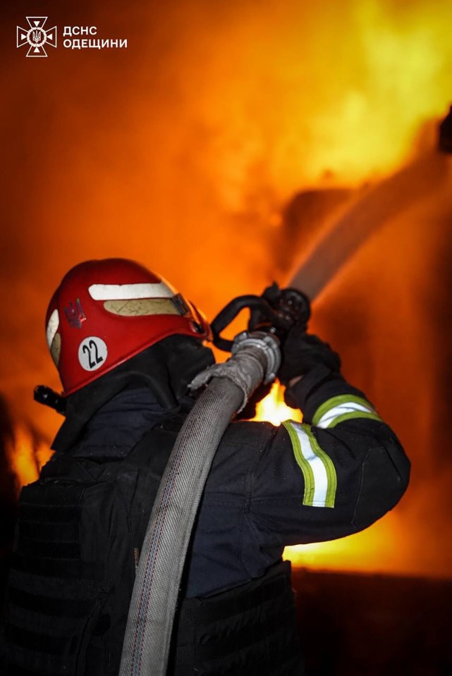 Firefighter battling blaze from Russian drone attack.