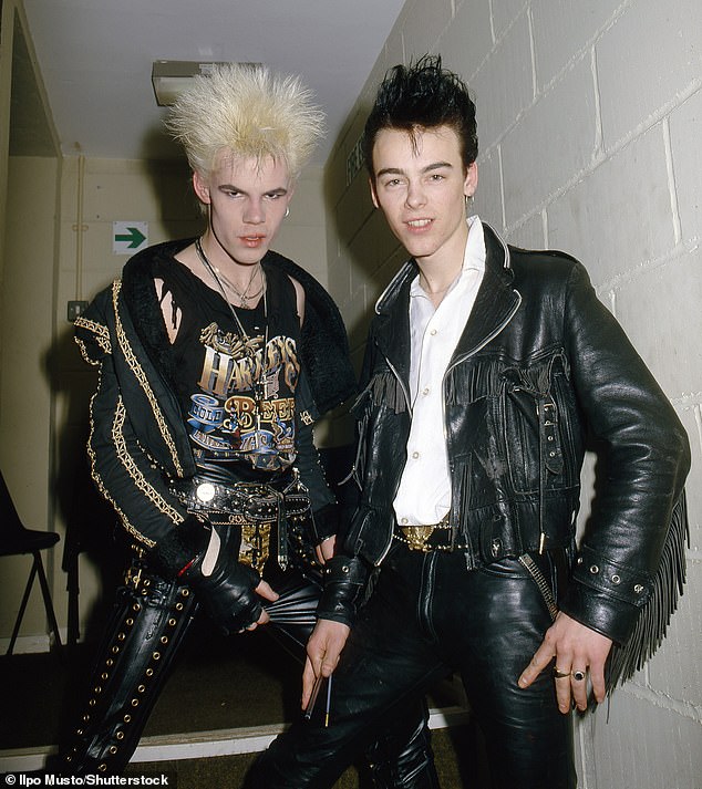 The sad news of his death was shared by bandmate Martin Degville in a Facebook tribute ( he is pictured left with bandmate Chris Kavanagh)