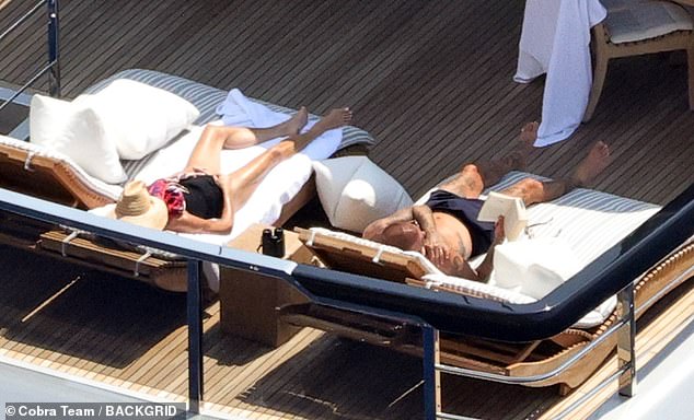 The Spice Girl and former footballer were spotted unwinding during a relaxing afternoon on deck in Capri