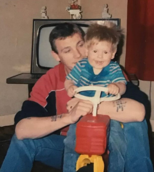 Photo of a father and his toddler son.