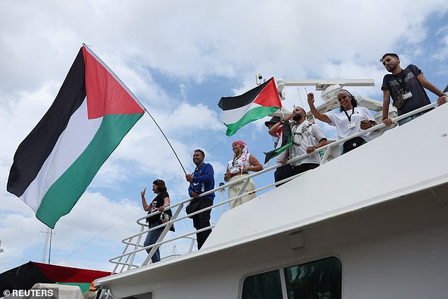 Activists wave Palestinian flags as they depart on the Global Sumud Flotilla, a humanitarian expedition to Gaza, at the port of Barcelona, Spain August 31, 2025