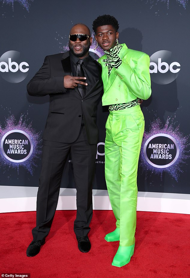 Lil Nas X and his father pictured in November 2019 in Los Angeles at the American Music Awards