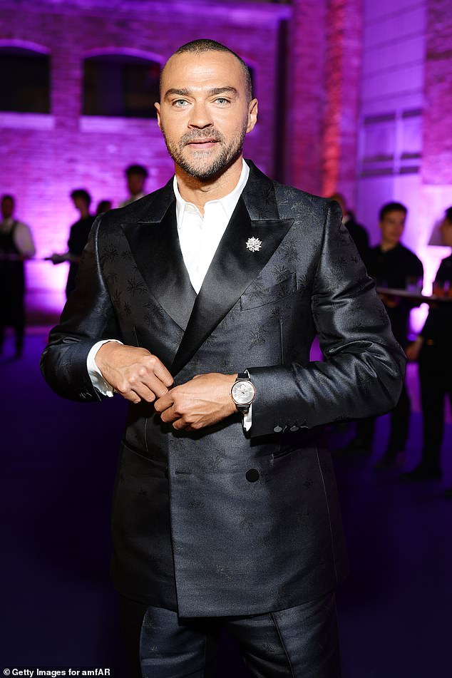 The actor's outfit boasted stain lapels and a subtle floral print