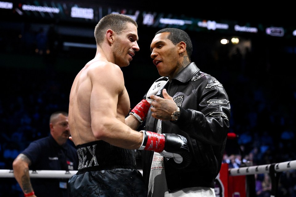 MANCHESTER, ENGLAND - AUGUST 30: Joey Essex speaks with Professional Boxer, Conor Benn, after victory in the Middleweight fight between Joey Essex and Joao Barbosa during the Misfits 22 - Ring of Thrones fight night at AO Arena on August 30, 2025 in Manchester, England. (Photo by Ben Roberts Photo/Getty Images)