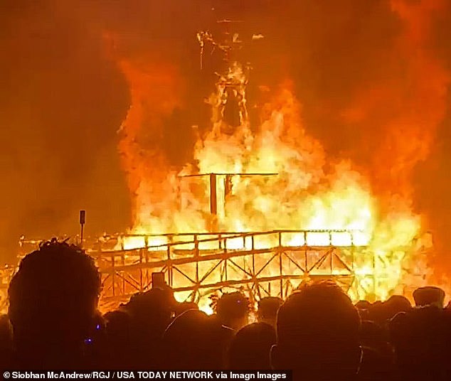 The Pershing County Sheriff's Office was notified by a person who discovered the man around 9.15pm on Saturday as the festival's 'Man' effigy began to burn (pictured)