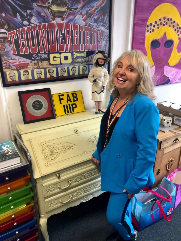 Dee Anderson with Thunderbirds memorabilia.