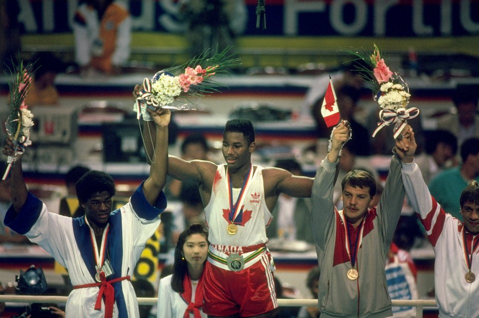Lennox Lewis of Canada celebrates his gold medal win at the 1988 Olympics.