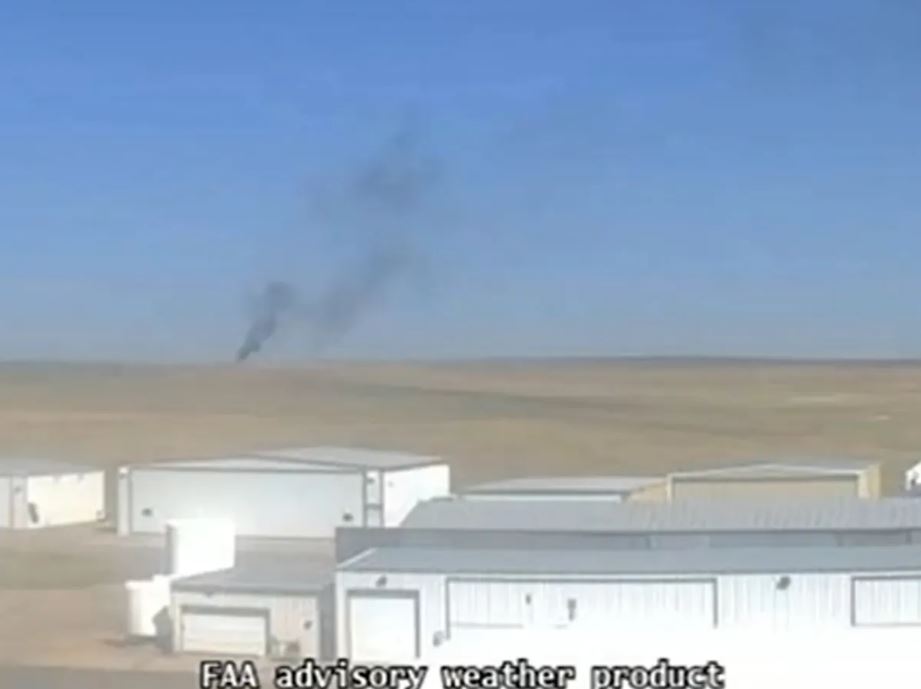Smoke billowing from plane crash.