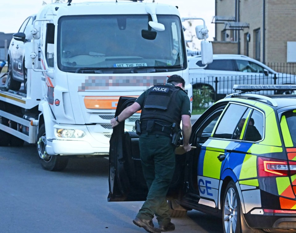 Police investigating a hit and run.