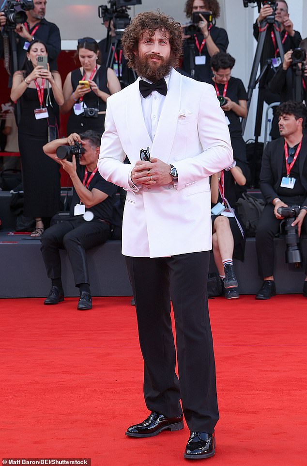 Aaron Taylor-Johnson, 35, looked almost unrecognisable as he hit the red carpet at the Frankenstein premiere during the Venice Film Festival on Saturday