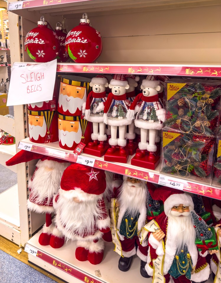 Christmas and Halloween decorations on sale in a store.