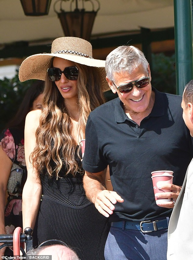Amal Clooney looked picture perfect as she supported sickly husband George while leaving Venice the morning after he battled a serious sinus infection on the Jay Kelly red carpet
