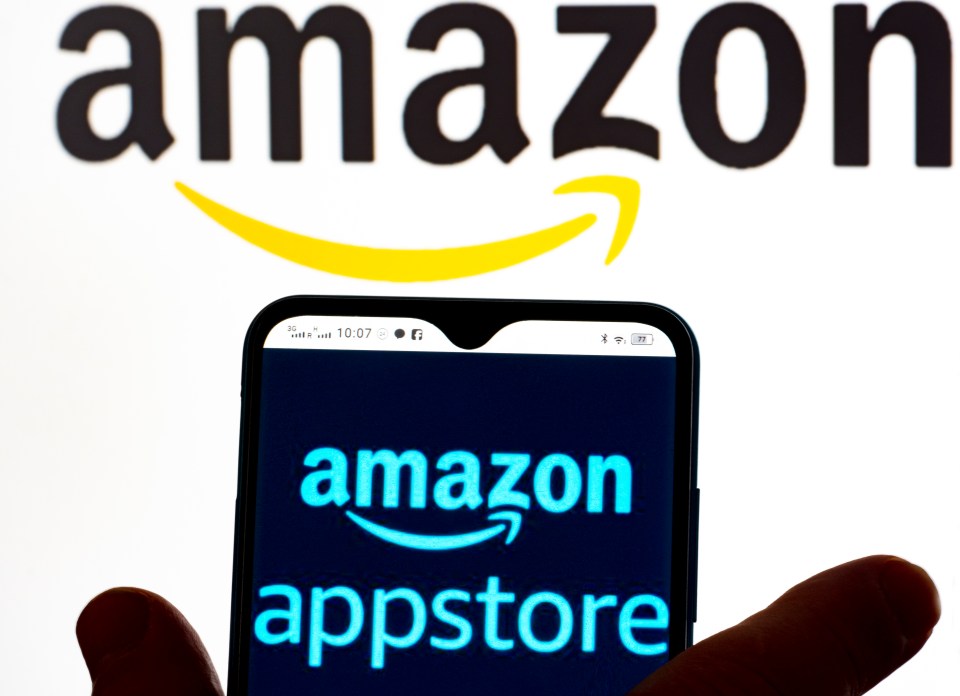 Photo illustration of the Amazon Appstore logo on a smartphone screen.