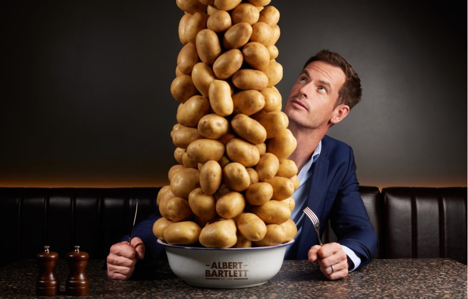 Andy Murray looking at a large bowl of Albert Bartlett potatoes.