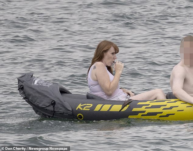 The Deputy PM was seen puffing on a vape as she spent time on a kayak with her family