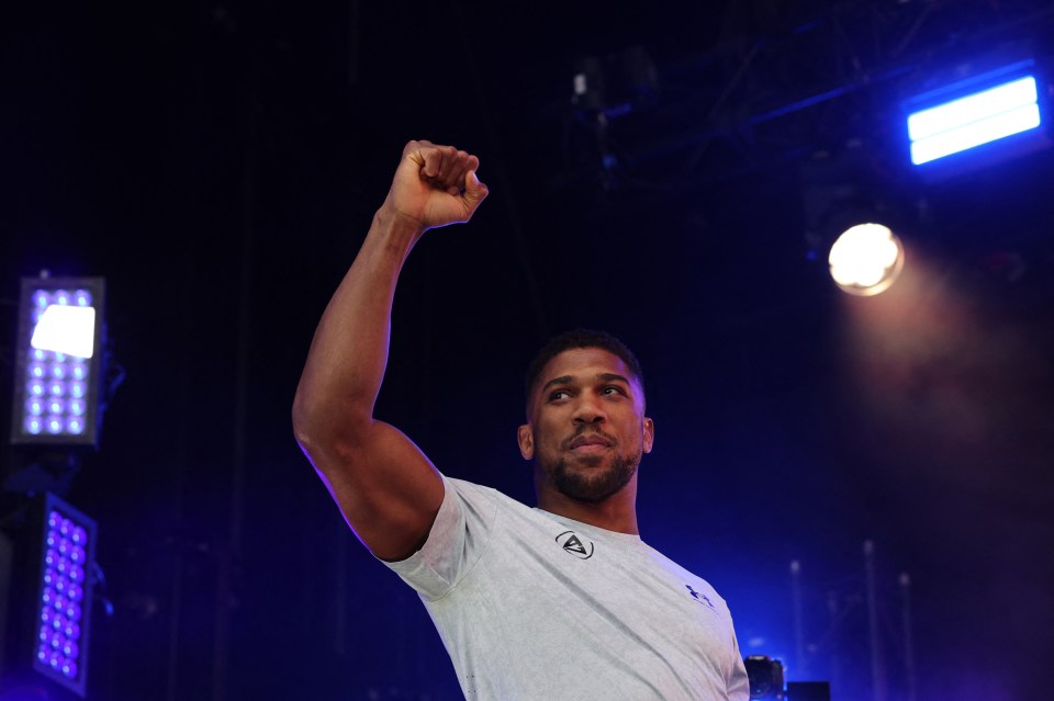 Anthony Joshua and Daniel Dubois at a boxing weigh-in.