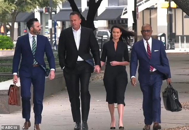 The couple are seen holding hands as they leave court during Hockridge-Reis' trial in June