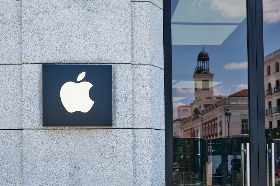 Apple logo on the exterior of a Madrid store.