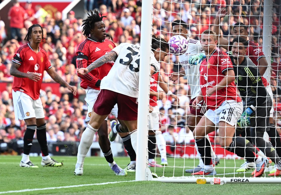 Riccardo Calafiori scoring a goal for Arsenal.