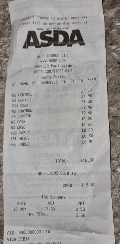 ASDA receipt showing purchase of video game accessories totaling £15.00.