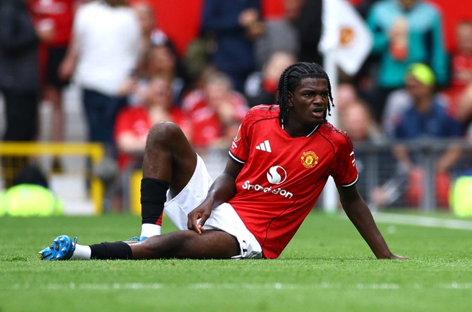 Manchester United's Ayden Heaven injured on the field.