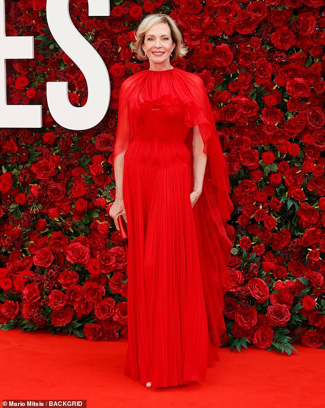 Allison showcased her ageless beauty in the dress which she paired with a matching red clutch bag