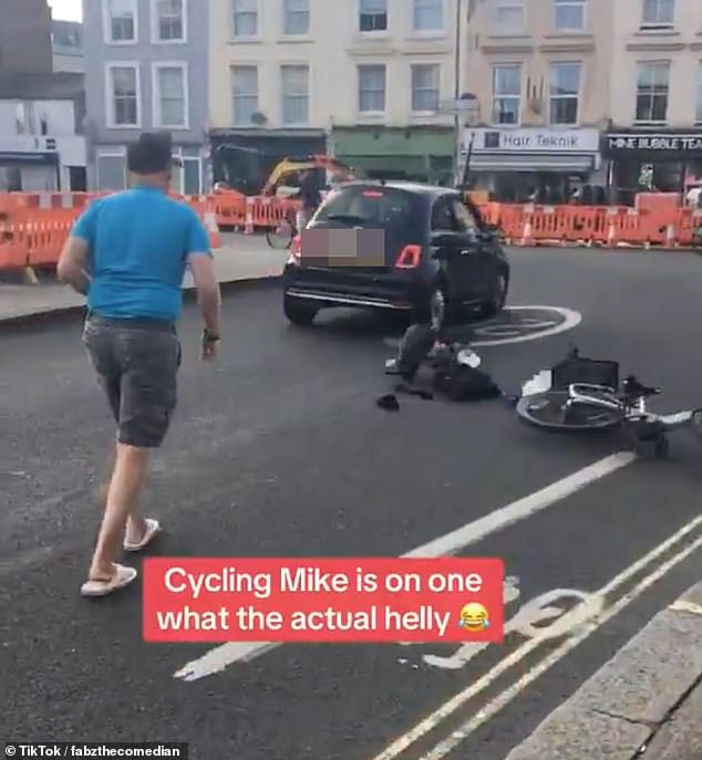 Mr Van Erp pushed his bike into the road and the car, splitting the bike into several parts