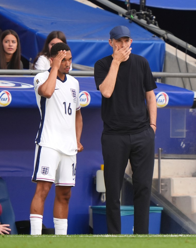Trent Alexander-Arnold and manager Thomas Tuchel on the touchline.