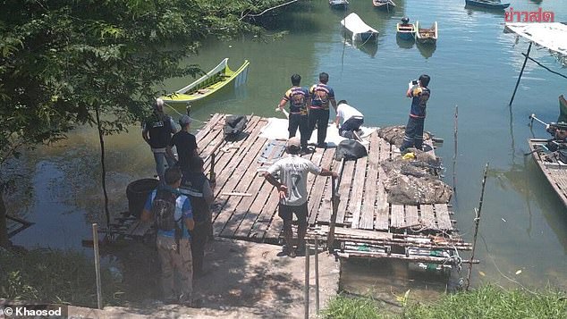 A woman's body has been found chained by the neck and tied underwater by two concrete dumbbells at a popular fishing spot in Thailand, according to reports