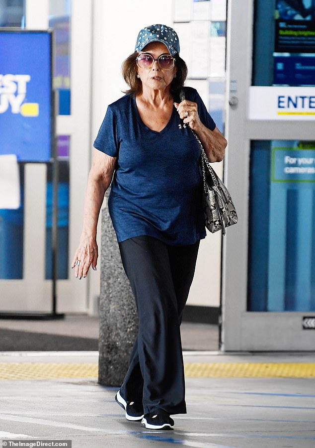 This actress, who once starred in an iconic James Bond scene, looked unrecognizable during a rare outing in Los Angeles this week. Can you guess who she is?