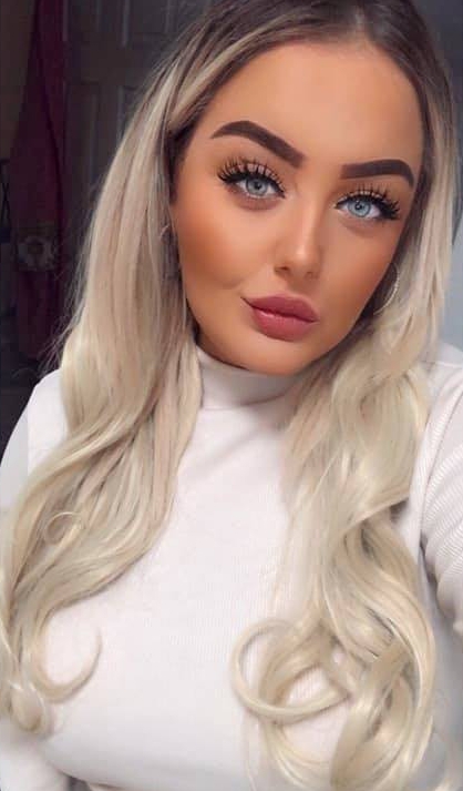 Headshot of Kim Hall, a British beautician.
