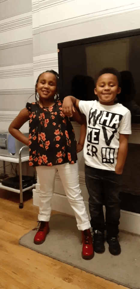 Two children posing for a photo.