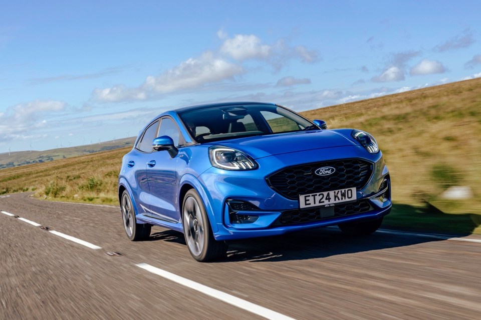 Ford Puma driving on a road.