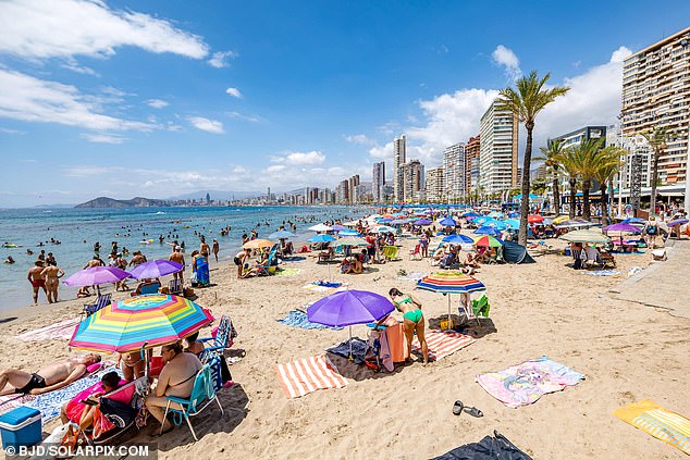 Tourists who lay out their towels for extended periods of time in parts of Spain, such as Costa Blanca (pictured) face potential fines of up to ¿250 (£210), as a number of popular holiday hotspots begin implementing the so-called 'sunbed tax'
