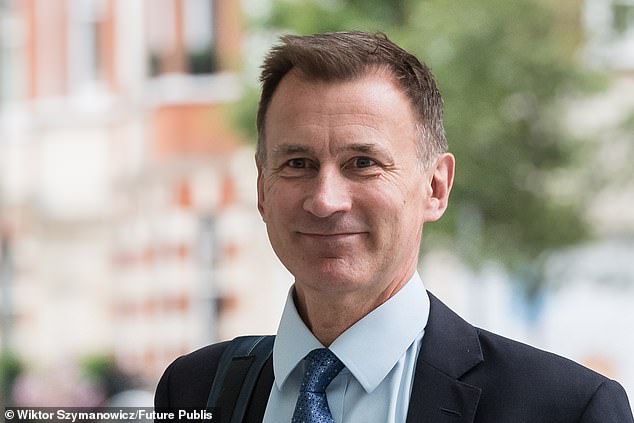 Former health secretary Sir Jeremy Hunt (pictured) fears society is ¿over medicalising¿ the impact of normal traumatic events ¿ and warned against signing people off work with anxiety and depression