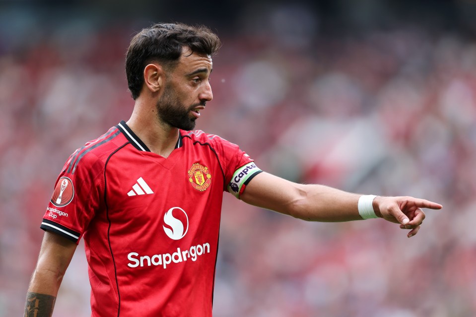 Manchester United soccer player in red uniform.