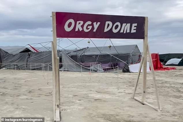 Burning Man's infamous 'Orgy Dome' has been destroyed by high winds during a severe dust storm that ripped through the Nevada festival site