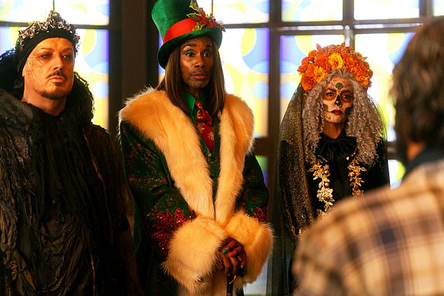 He is guided through his soul-searching journey by three Ghosts of Christmas, played by global icons Eva Longoria (R), Billy Porter (M) and Boy George (L)