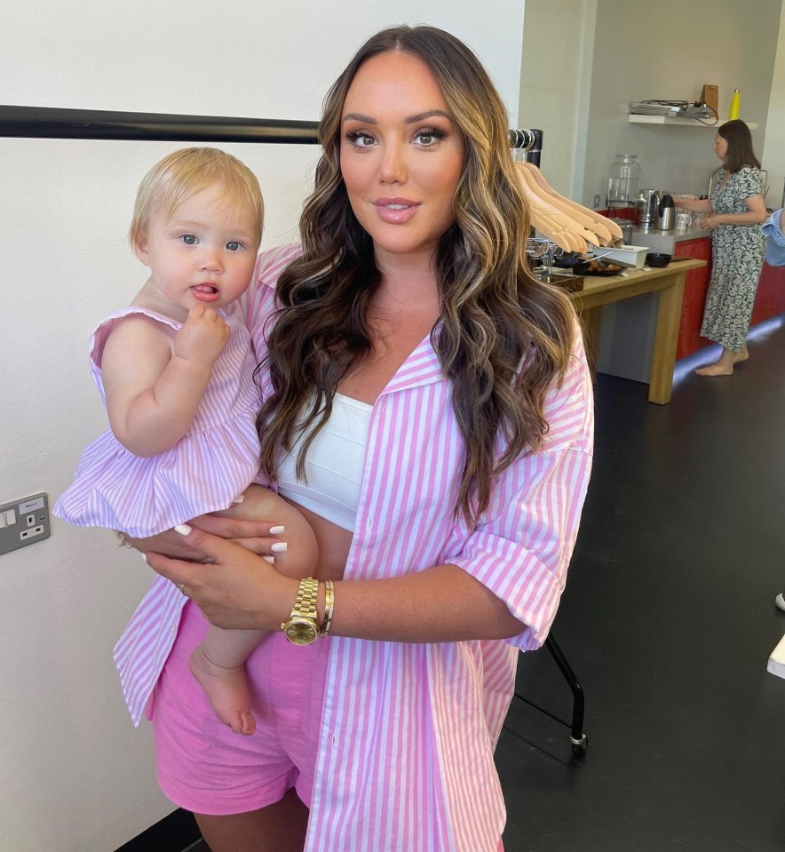 Charlotte Crosby holding her baby, Alba.