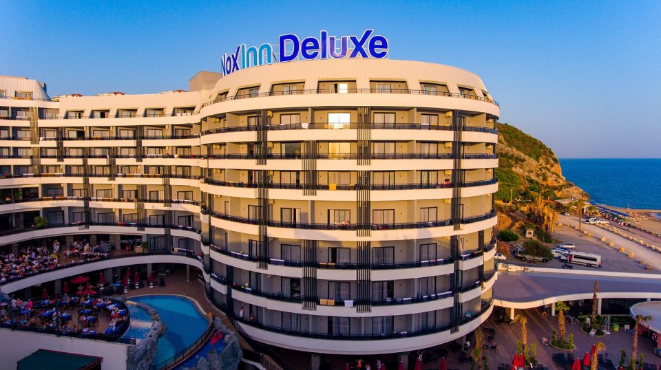 NoxInn Deluxe Hotel overlooking the sea.