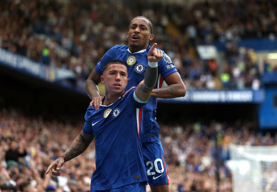 Enzo Fernandez and Joao Pedro of Chelsea celebrating a goal.