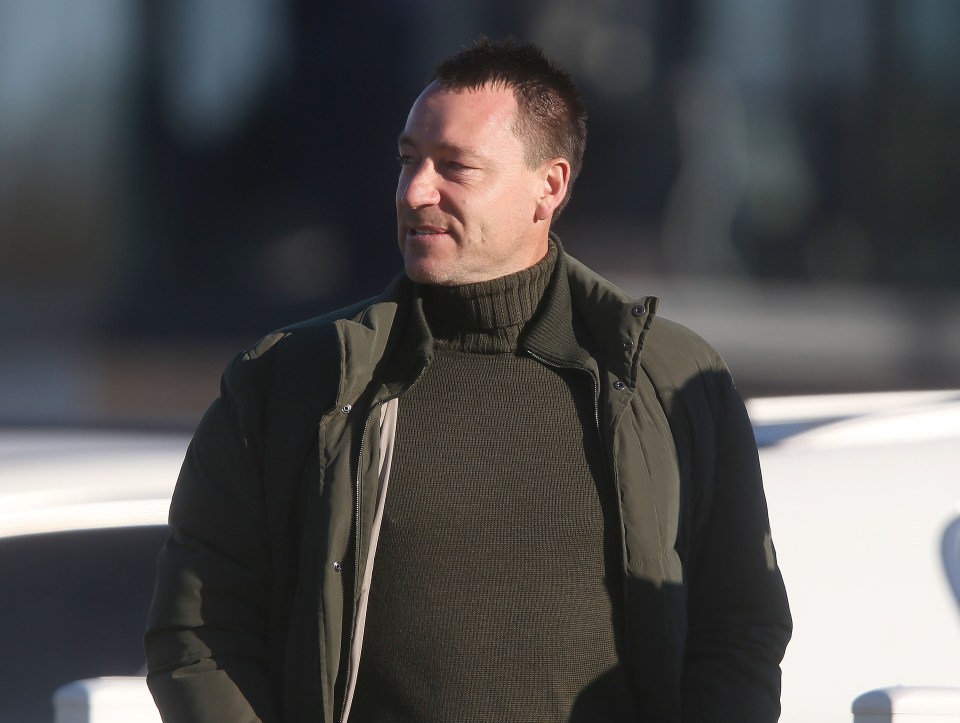 John Terry watching a Chelsea U23 soccer match.